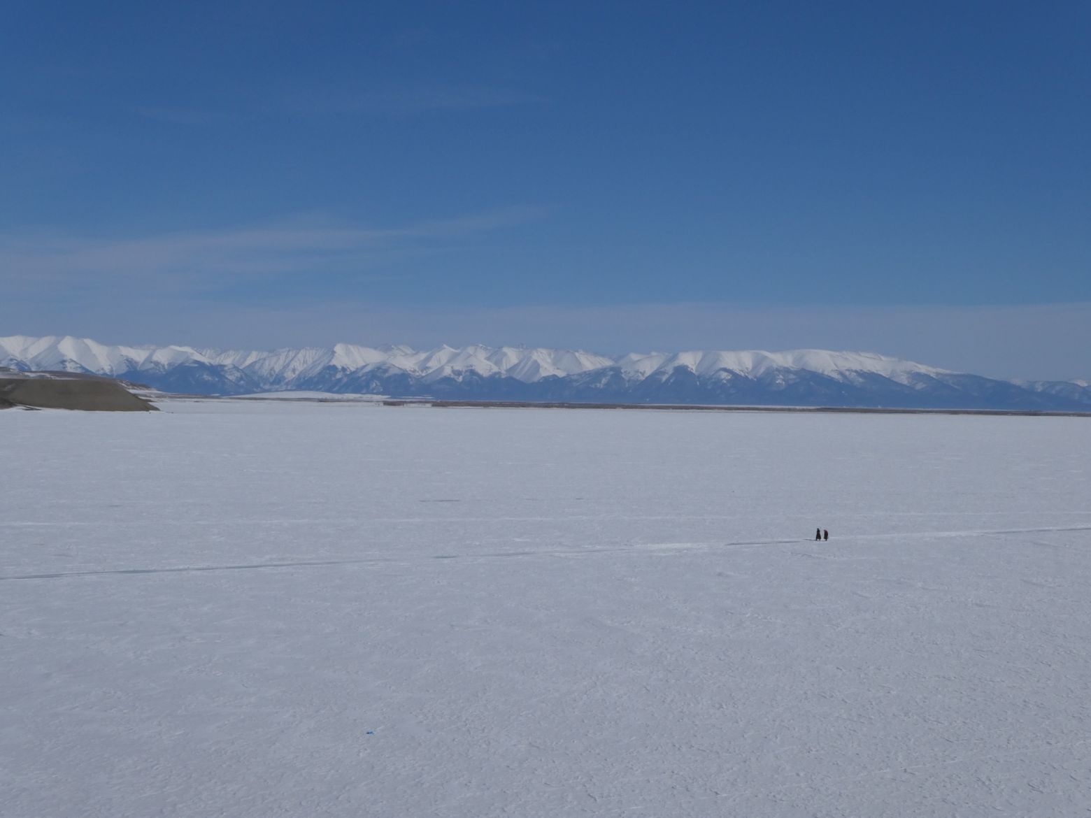 Women collecting ice on the lake at Tsaaganuur